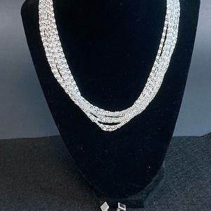 Sarah Coventry 8 strand silver tone necklace and earrings set